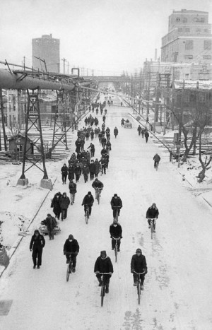 Workers leaving a factory at the end of the day, Anshan, 1957