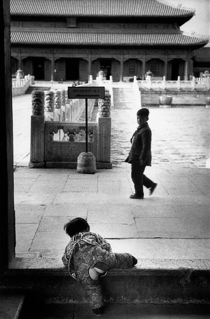 Child wearing traditional chinese-style toilet training pants in the Forbidden City, Beijing, 1957