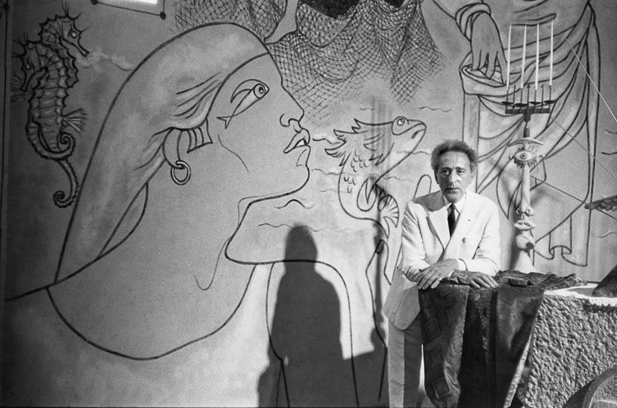 Jean Cocteau inside the chapel Saint-Pierre, Villefranche-sur-Mer, which he decorated, France, 1957