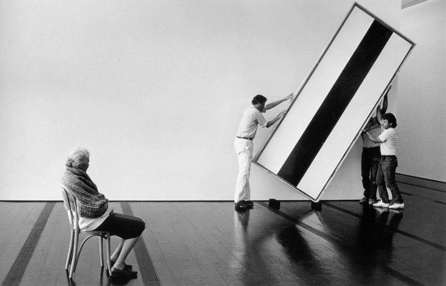 Installation of a Barnett Newman artwork in the Menil Collection, Houston, 1991. On the left: Dominique de Menil.
